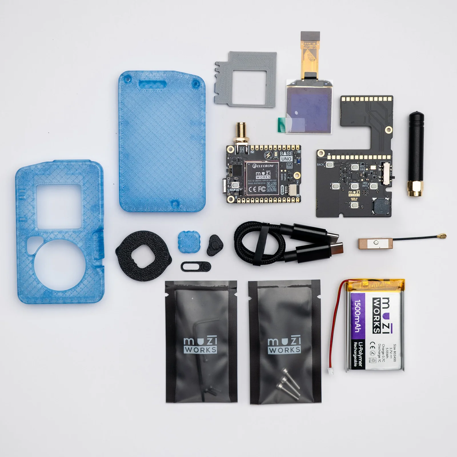 Muzi.Works SuperBase DIY kit components laid out before assembly