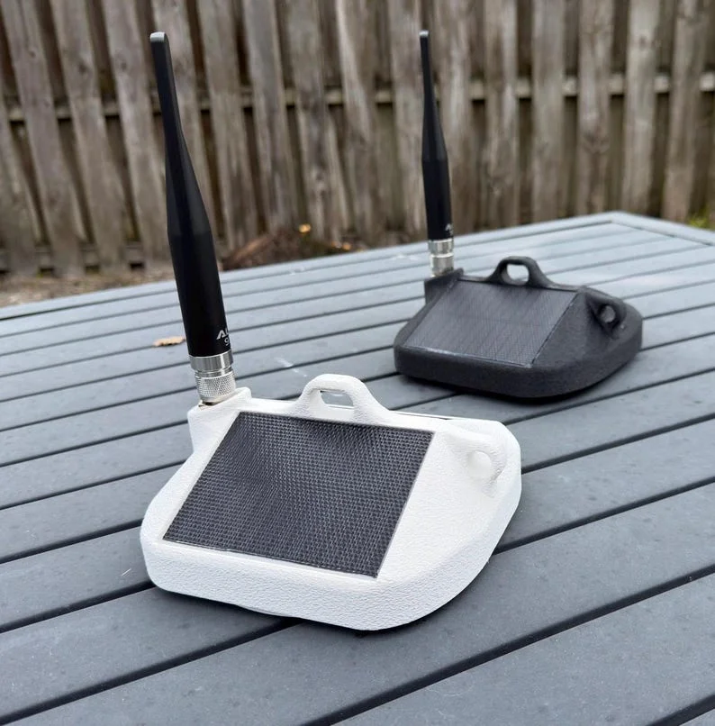 PeakMesh Airdrop low-profile solar radio with antenna and mounting loops