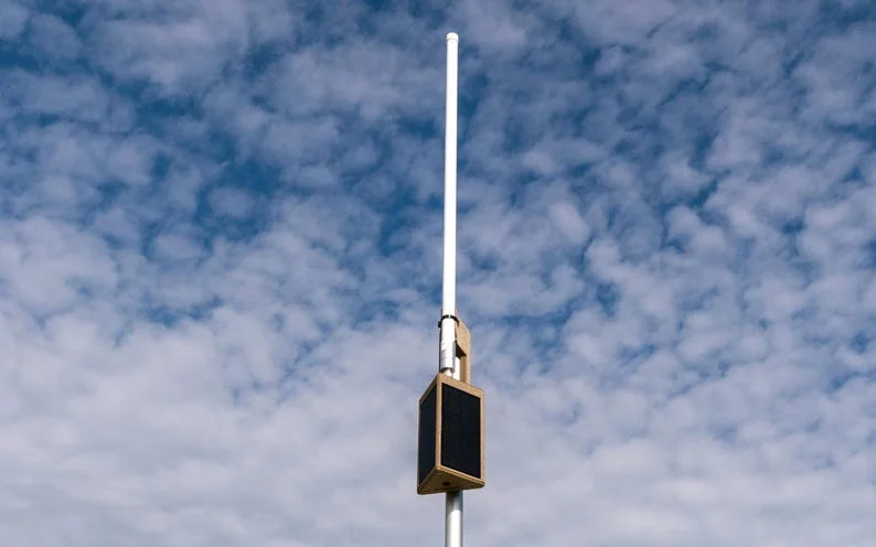 PeakMesh Summit pole-mounted solar radio with antenna