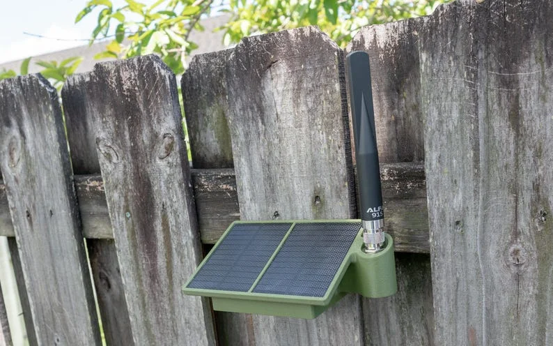 PeakMesh Ultimate solar radio with two solar panels and antenna